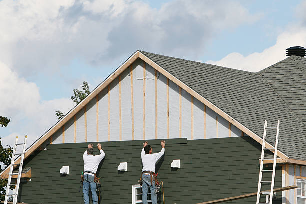 Professional Siding Contractor technician working in Queen, PA